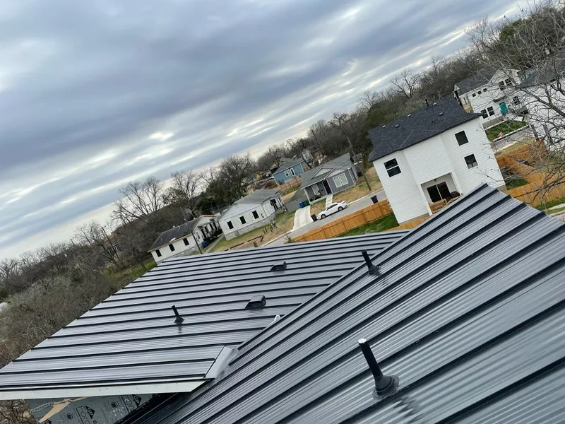 Standing seam metal roof panels with vents for Skylight Repair in Inwood
